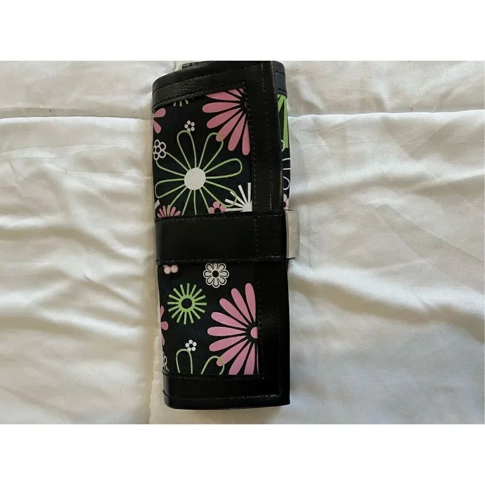 Black and bright floral print jewelry roll